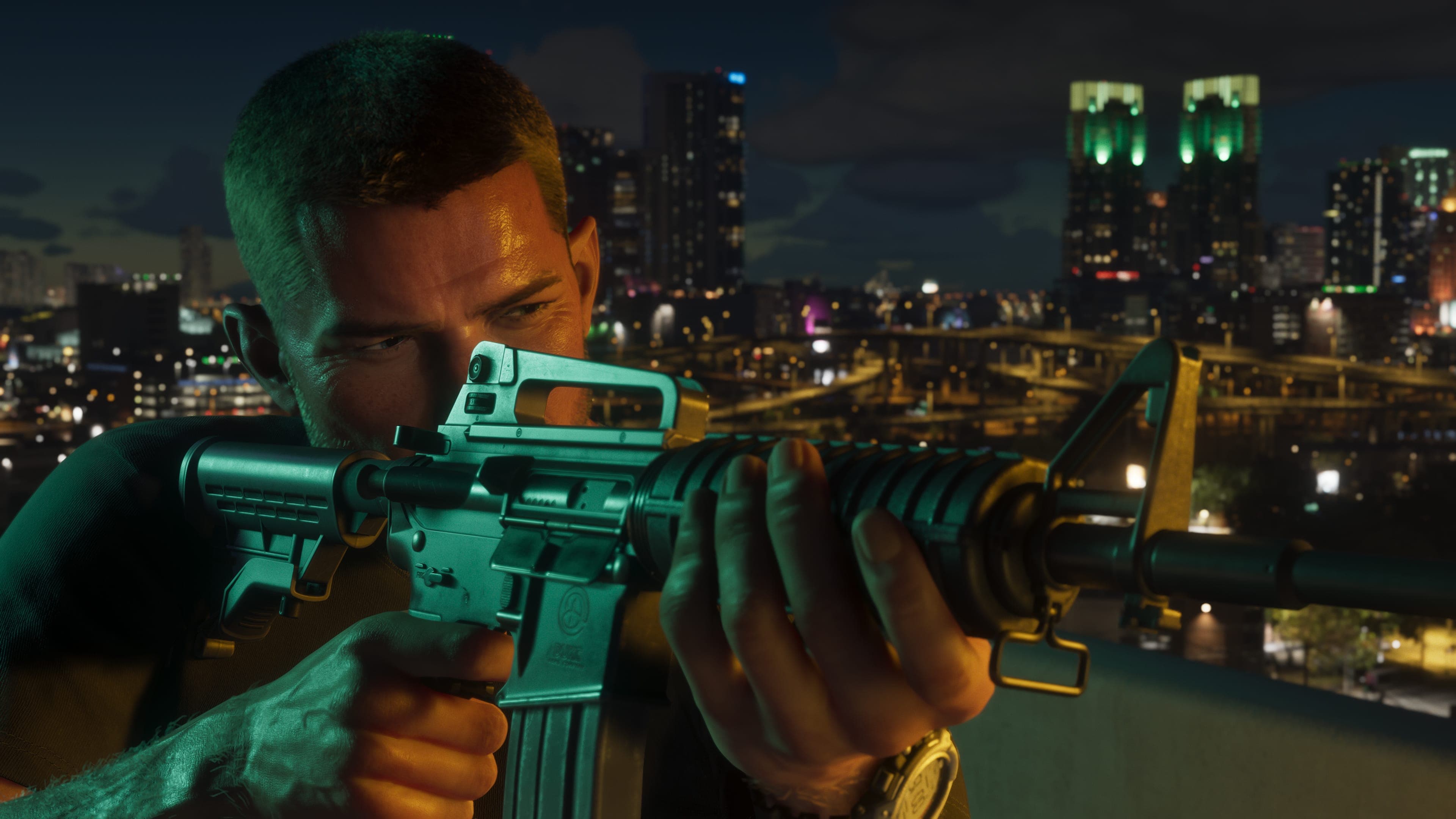 Jason Duval aims a rifle from a rooftop with the Vice City skyline lit up behind him