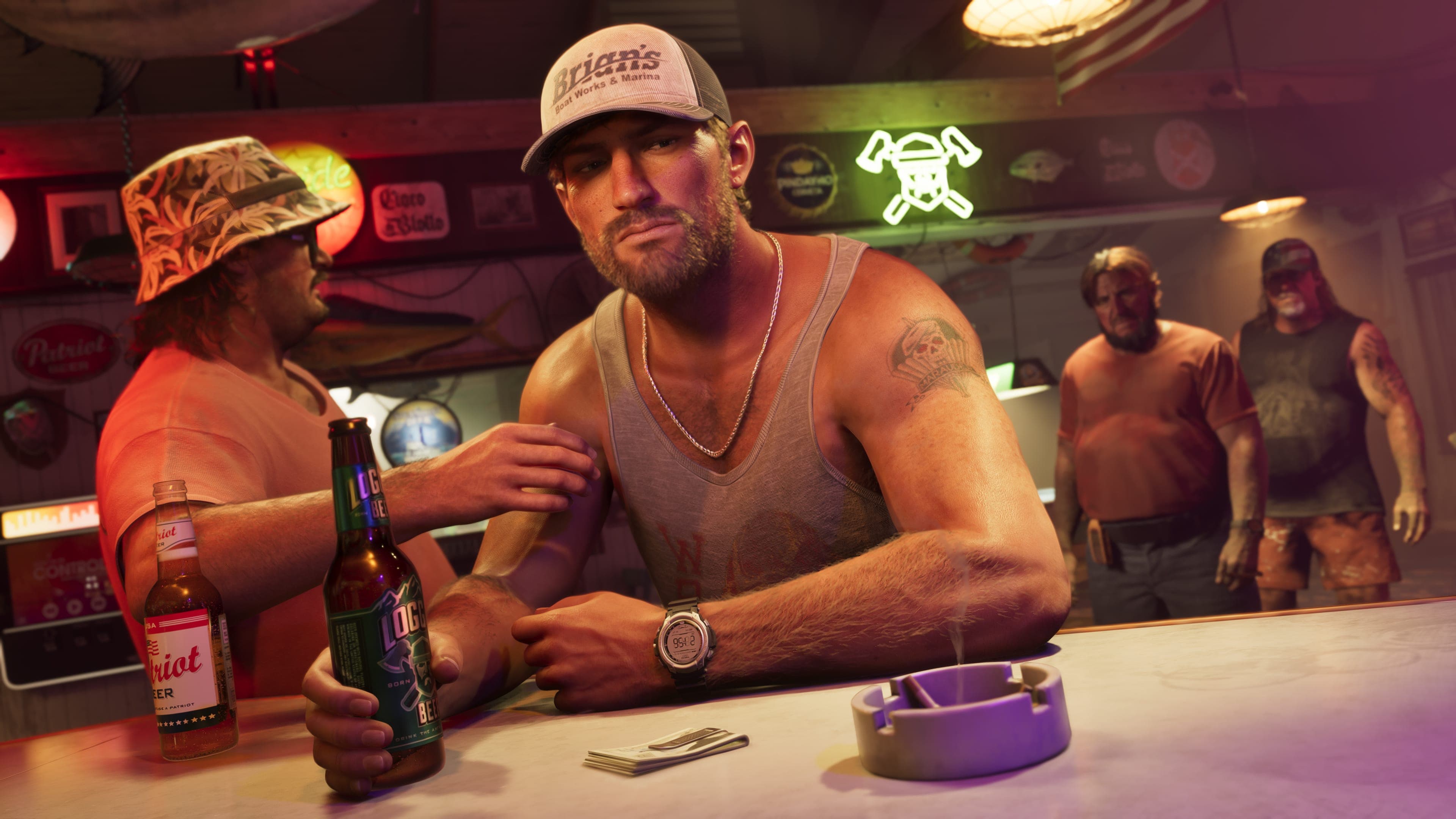 Jason Duval in a Brian's cap sits at a bar with a beer, surrounded by locals