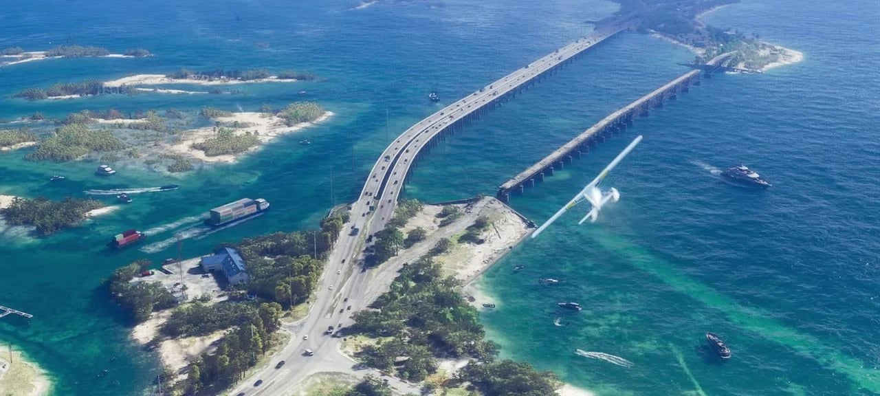 Puentes paralelos, uno moderno y otro antiguo, sobre el agua turquesa de los Cayos de Leonida en el Tráiler 1 oficial