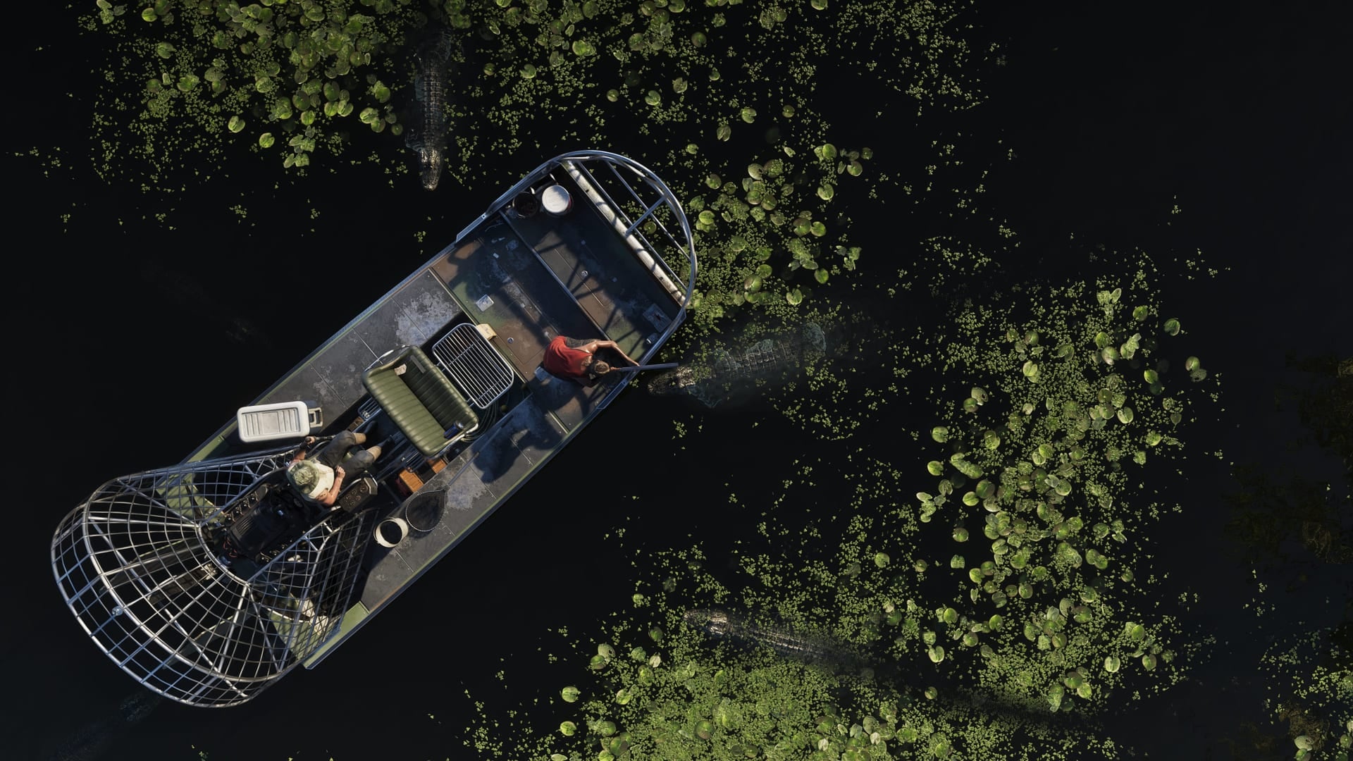 Official GTA VI screenshot of an airboat surrounded by alligators in Grassrivers, seen from above.